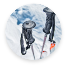 close-up of ski poles in snow